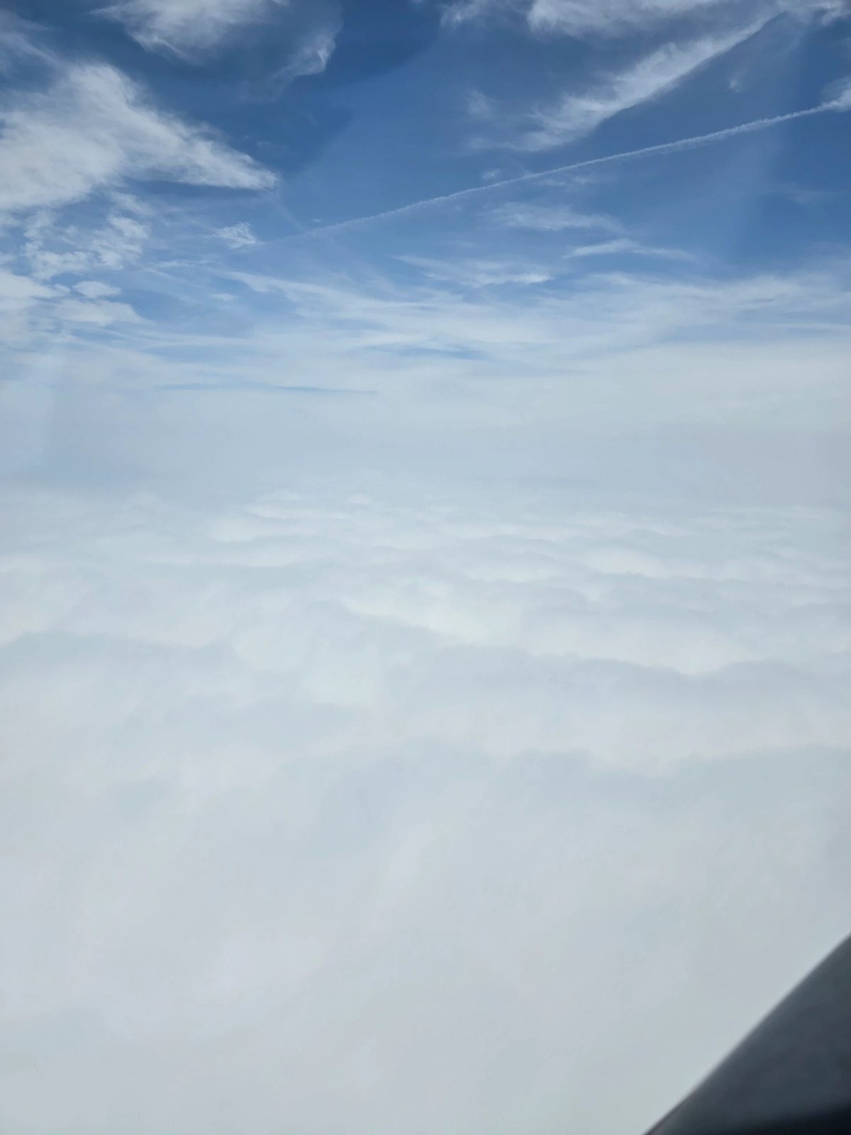View above the clouds from a Kingdom Planes flight